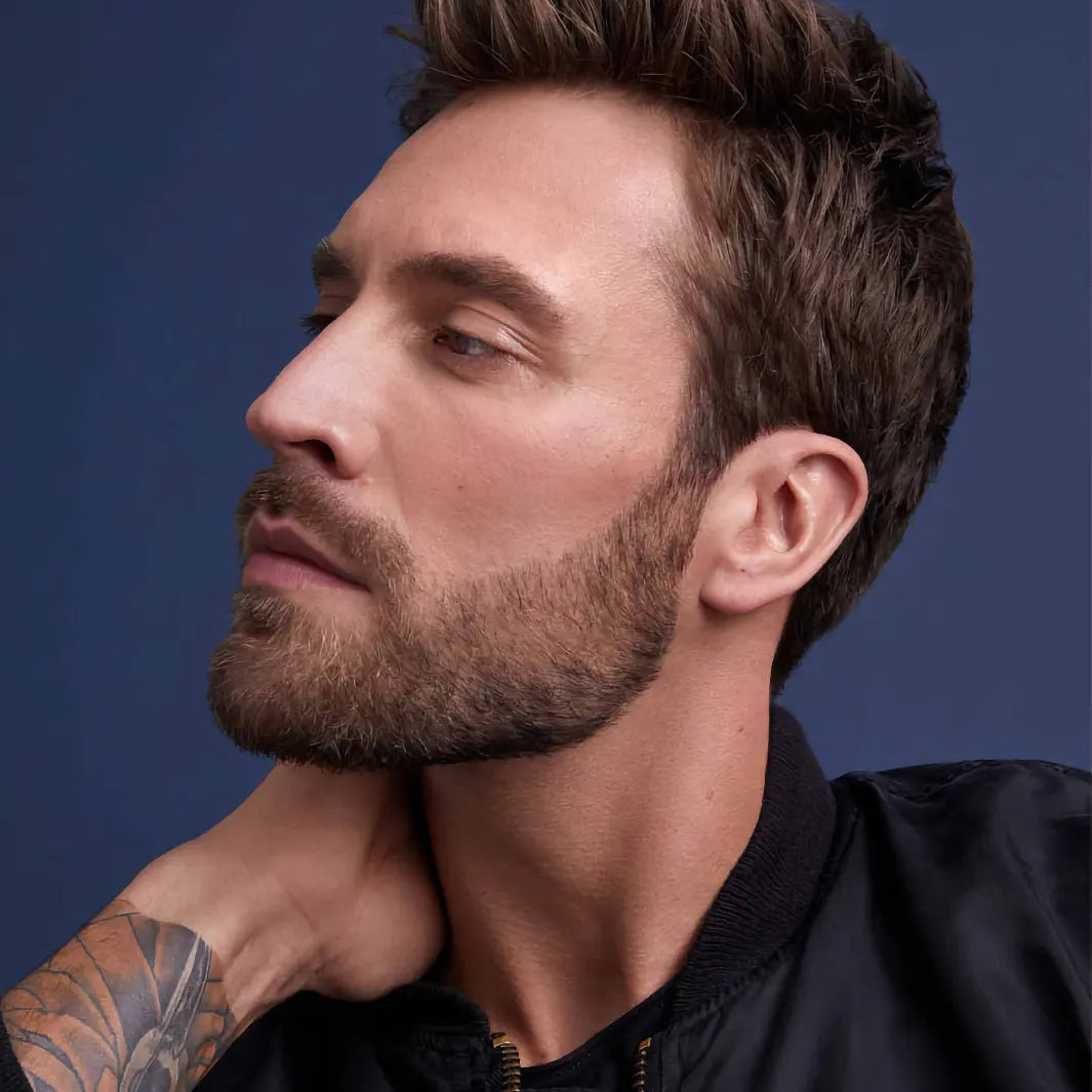 Man med välvårdat skägg stylat med Graham Hill Mulsanne Relaxing Beard Oil